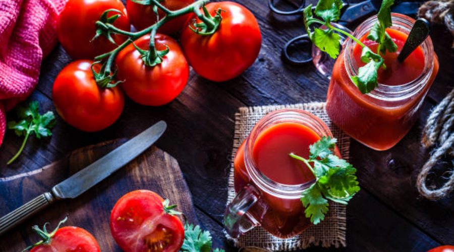 tomato juice in glass bottle